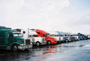 learn currency trading - a row of trucks